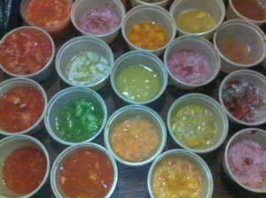 A rainbow of fermenting tomato seed.